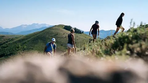 Hikers ascending a trail at Deer Valley in Park City, Utah 