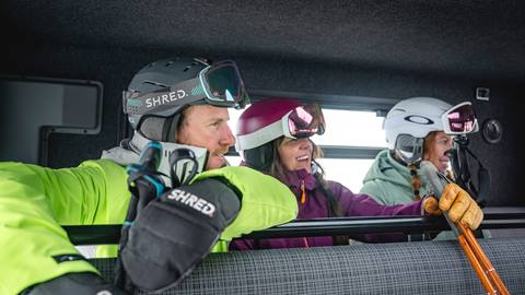 Group of skiers sitting in snowcat at Deer Valley