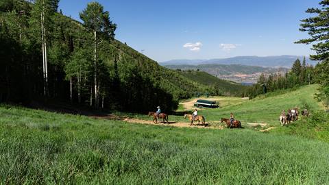 Group of people horseback riding at Deer Valley.