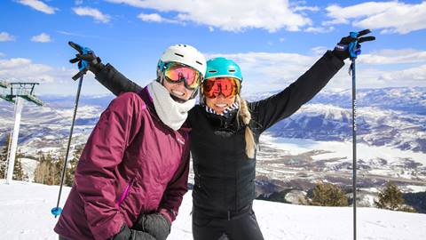 Jillian Vogtli posing for photo with guest at Deer Valley.