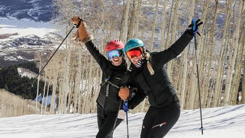 Two women skiing at Deer Valley Resort.