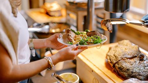 Guest being served VIP dinner at Deer Valley Mountain Beer Festival