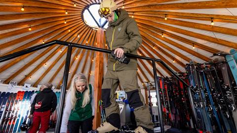 Deer Valley staff helping a guest with demo skis at the Rossignol High Performance Test Center.