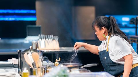 Chef Lee Anne Wong participating in cooking competition.