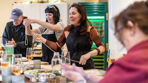 Guests attending Taste of Luxury cooking class.