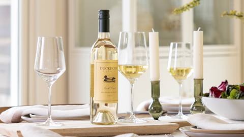 Duckhorn white wine displayed on table