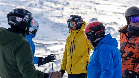 Group of skiers talking to Ted Ligety at Deer Valley.