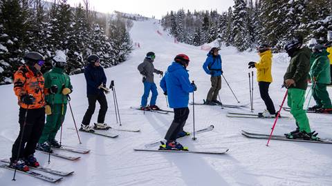 Ted Ligety talking to a group of skiers at a clinic at Deer Valley.