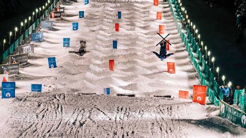 Two athletes competing in Dual Moguls event at Deer Valley World Cup.