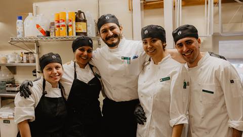 Deer Valley Food and Beverage staff members smiling for group photo.