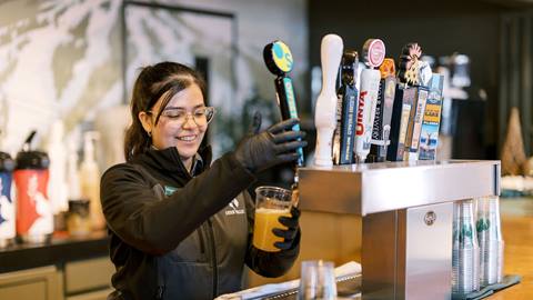 Deer Valley staff serving beer on tap at the Daly Lift in Silver Lake Lodge.