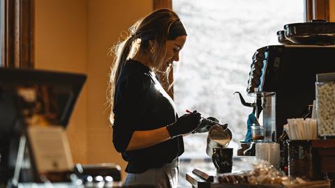 Barista making a coffee at Deer Valley Café.