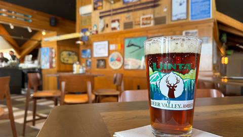 Deer Valley-branded beer glass displayed on a table at Royal Street Bar