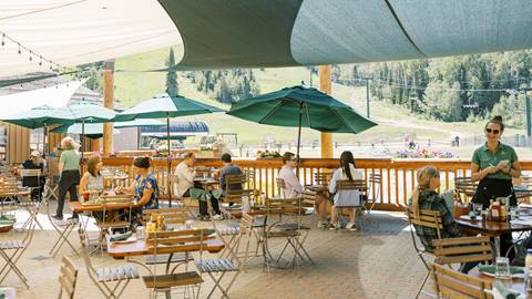 Guests eating on the Royal Street Cafe during the summer.