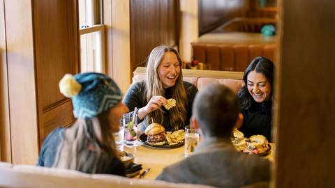 Guests eating lunch at Royal Street Café in the winter.