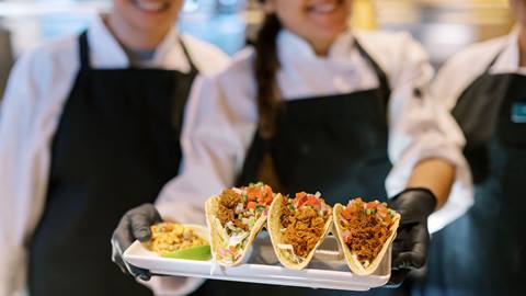 Deer Valley staff serving tacos at Silver Lake Restaurant.