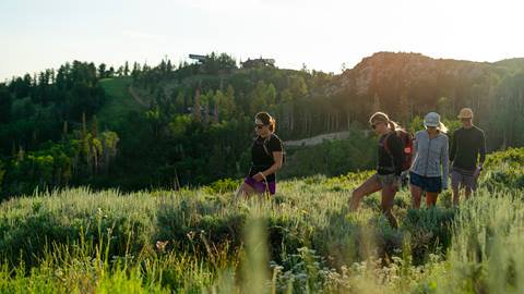 Group of friends hiking at Deer Valley during the summer.