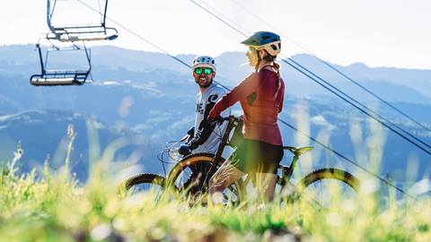 Two guests mountain biking at Deer Valley.