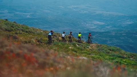 Five guests mountain biking at Deer Valley.