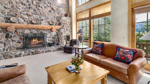 Living room in Deer Valley Lodging Property 3020 Thistle in the summer.