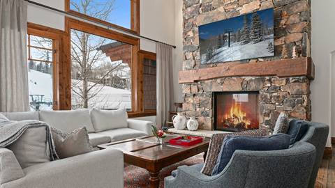 Grand Lodge 405 living room with fireplace.