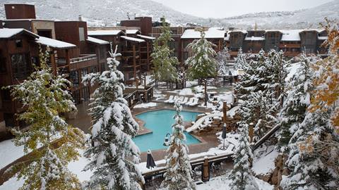 Silver Baron Lodge exterior and pool in the winter.