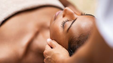 Guest having facial massage performed