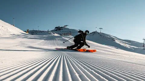 Guest skiing on Quiver ski rentals.