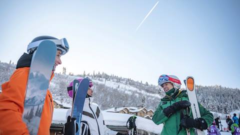 Deer Valley ski instructor talking to two women.