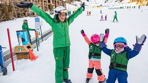 Two young girls excited in a ski lesson at Deer Valley.