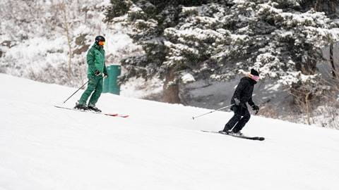 Deer Valley Ski Instructor teaching teenager during a private ski lesson.