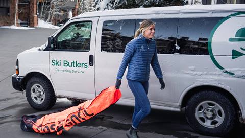 Ski Butlers ski delivery service delivering skis to guest.