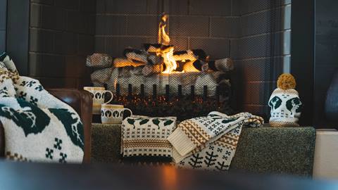 Deer Valley Legacy Collection displayed in front of fireplace