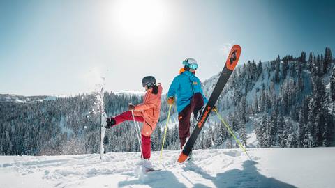 Guests shaking snow off skis on a powder day at Deer Valley.