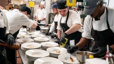 Deer Valley cooks preparing dish