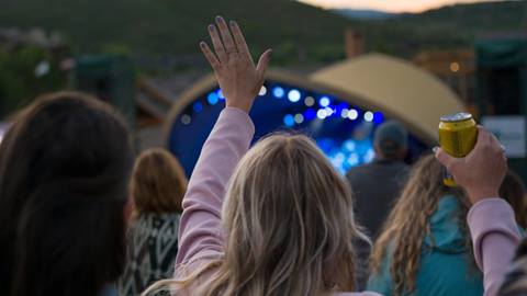 Concert-goer enjoying music at Deer Valley in Park City, Utah